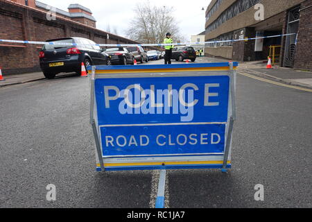 Windsor, UK. 13th January 2019. A road closure outside Victoria Street car park in Windsor due to a police incident. Matthew Ashmore/Alamy Live News Stock Photo