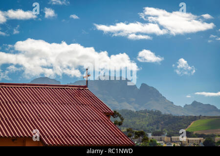 STELLENBOSCH, SOUTH AFRICA - NOVEMBER, 2018: Church of Kayamandi township and beautiful view of the mountains Stock Photo