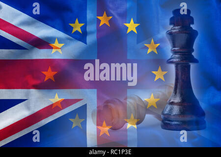 Two chess pieces against overlapped flags of Great Britain and European Union Stock Photo