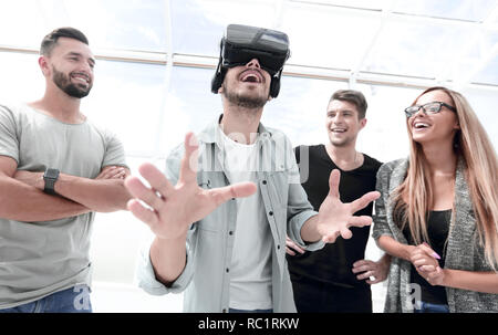 Testing new technologies. Attractive young woman in VR headset g Stock Photo