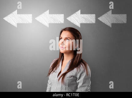 Business person choosing between several directions  Stock Photo