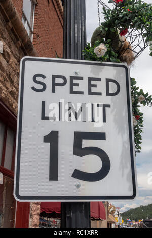 Generic 'Speed Limit 15' road sign attached to a lamp post in Williams, northern Arizona, USA. Stock Photo