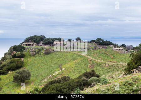 Little  sheep barn on a cliff top  at the North Eastern coast of Sardinia in Italy Stock Photo