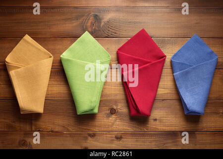 cloth napkin on wooden table background Stock Photo