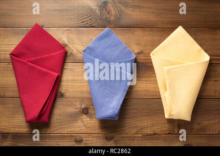 cloth napkin on wooden table background Stock Photo