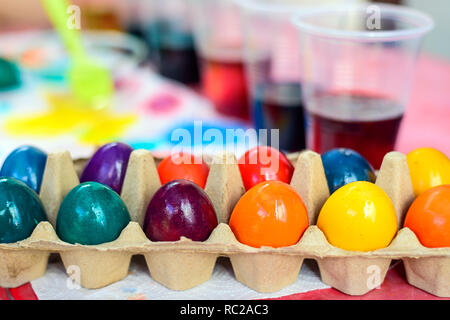Freshly colored Easter eggs packaged in moulded carton box Stock Photo