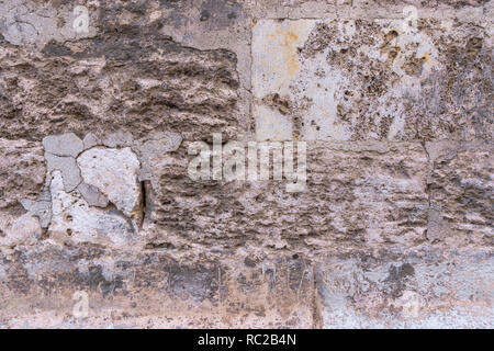 Ancient brick  and stone wall. Mediterranean style. Spanish and Roman design. Aged wall. Stock Photo