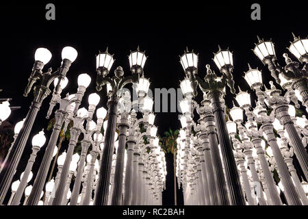 Los Angeles, California, United States - August 9, 2018: Urban Light, sculpture at the entrance of Los Angeles Contemporary Art Museum, LACMA, composed of row street lamps. Black and white shot.