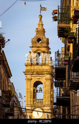 Bell tower of the Church of St. Ignatius at Olivella seen from Piazza Verdi across Via Orologio opposite Massimo theatre, Palermo, Sicily. Stock Photo