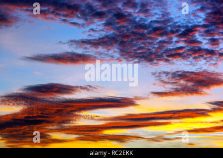 Dramatic sunset sky, red sunset clouds on bloody sky, dramatic clouds, moody sky Stock Photo