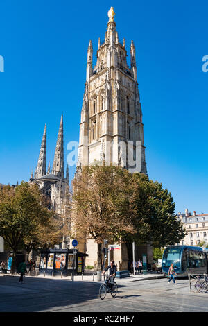 Bordeaux, France - 27th September, 2018: Cycalist passing by  Cathedral Saint Andre in Bordeaux, France