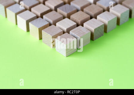 Wood cubes arranged in pattern geometric Stock Photo