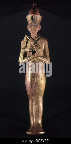 USHEBTI DE TUTANKAMON (MADERA CUBIERTA DE ORO) - PROC TUMBA DE TUTANKAMON -1361/42 AC. Location: EGYPTIAN MUSEUM. KAIRO. Stock Photo