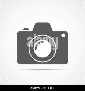 Gray camera icon in flat design. Vector illustration. Camera icon isolated on white background. Stock Vector