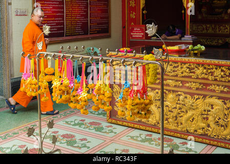 offerings in Wat Mangkon Kamalawat temple during Chinese New Year Celebrations in Bangkok, Thailand Stock Photo