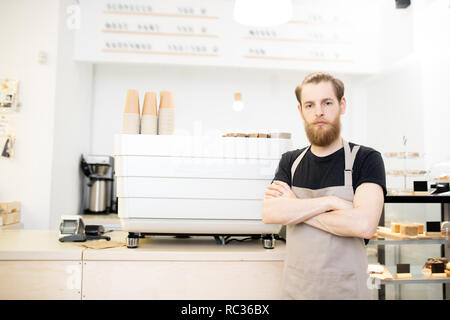 Young entrepreneur in coffee shop Stock Photo