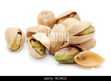 heap of ripe dry pistachios isolated on white background Stock Photo
