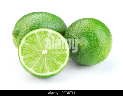 fresh ripe sliced lime fruits isolated on white background Stock Photo
