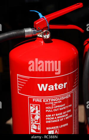 Close up of fire extinguisher outdoors Stock Photo