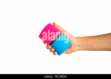 Woman hand holding kinesiotape isolated on white background Stock Photo