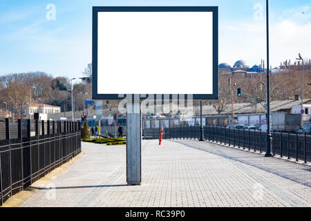 Blank white mockup of billboard in empty Istanbul street Stock Photo