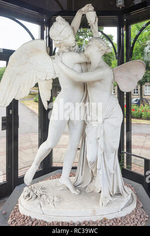 Statue of Cupid & Psyche in glass pavilion, Crescent Gardens, Harrogate, North Yorkshire, England, United Kingdom Stock Photo