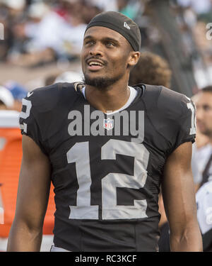 Oakland, California, USA. 30th Aug, 2015. Oakland Raiders wide receiver Brice Butler (12) check new score board on Sunday, August 30, 2015 at O.co Coliseum in Oakland, CA. The Cardinals defeated the Raiders 30-23 in a preseason game. Credit: Al Golub/ZUMA Wire/Alamy Live News Stock Photo