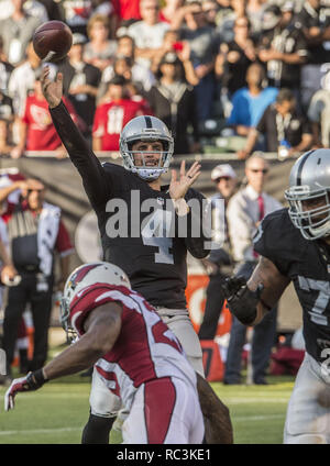 Oakland, California, USA. 14th Aug, 2015. Oakland Raiders new head coach  Jack Del Rio with quarterback Derek Carr (4) during pregame warm-ups on  Friday, August 14, 2015, in Oakland, California. The Raiders