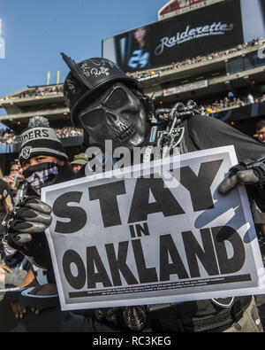 Oakland, California, USA. 30th Aug, 2015. Black Hole fans send message to Raiders on Sunday, August 30, 2015 at O.co Coliseum in Oakland, CA. The Cardinals defeated the Raiders 30-23 in a preseason game. Credit: Al Golub/ZUMA Wire/Alamy Live News Stock Photo