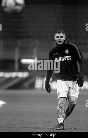 Black and White image of Forward Mauro Icardi (Inter) prior to the Italian Cup 'Coppa Italia' football match, Inter Milan vs Benevento Calcio at San Siro Meazza Stadium in Milan, Italy on 13 January 2019. The football match is played behind closed doors after Napoli's Senegalese player Kalidou Koulibaly was subject to racist chants by FC Internazionale's 'ultra' fans during the Boxing Day match. Credit: Piero Cruciatti/Alamy Live News Stock Photo