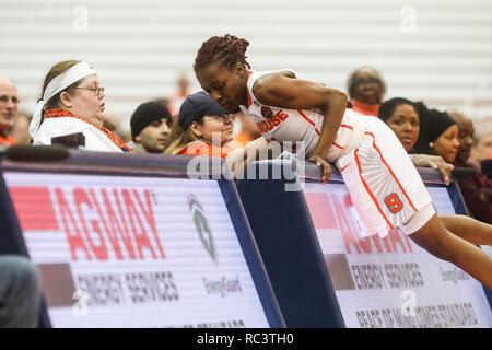 Syracuse, New York, USA. 13th Jan, 2019. January 13, 2019 : Syracuse's Gabrielle Cooper (11) almost runs into a fan during the NCAA basketball matchup between the Syracuse Orangewomen and University of North Carolina Lady Tar Heels at the Carrier Dome in Syracuse, New York. Syracuse leads the first half over North Carolina 56-37. Nick Serrata/Eclipse Sportswire/CSM/Alamy Live News Stock Photo