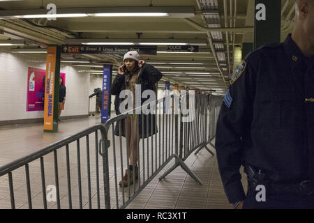New York, New York, USA. 13th Jan, 2019. Participants in the '18th No Pants Subway Ride' in the Union square station on January 13, 2019 in New York. - The 'No Pants Subway Ride' is an annual event started in 2002 by Improve everywhere in New York Credit: Wonwoo Lee/ZUMA Wire/Alamy Live News Stock Photo