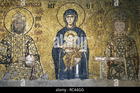 John II Comnenos (1087-1143) and Empress Irene (1088-1134). Byzantine emperors. In the centre, the Virgin Mary and Infant Jesus. Mosaic of the South Gallery. Hagia Sophia. Istanbul. Turkey. Stock Photo