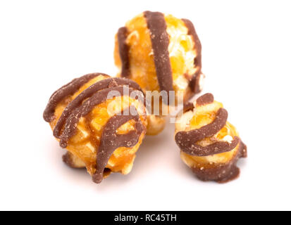 Chocolate Stripped Caramel Popcorn on a White Background Stock Photo