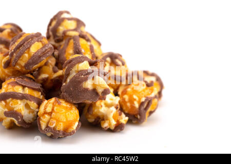 Chocolate Stripped Caramel Popcorn on a White Background Stock Photo