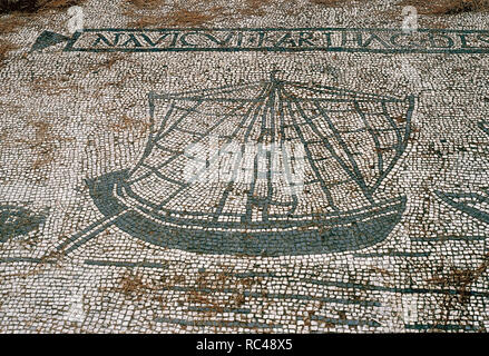 Ostia Antica. Mosaic depicting a cargo ship from Carthage. Square of the Guilds or Corporations. Stock Photo