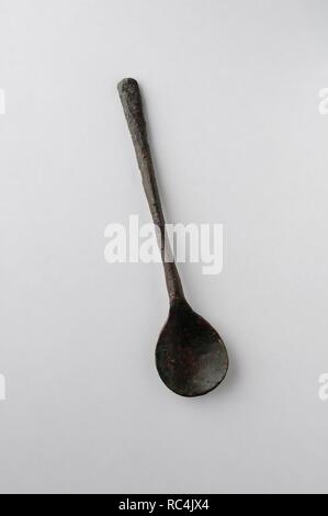 Spoon handle made of bronze . Length 12.3 cm Width 2, 7 cm - Medieval period from the archaeological site of the ' Calle seises ' in Alcalá de Henares - ' Burgo de Santiuste Museum ' (Madrid). SPAIN. Stock Photo