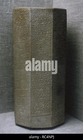 The Taylor Prism. The Sennacherib Prism. Library of Ashurbanipal. Hexagonal clay prism foundation record list campaigns of Sennacherib until the start f his final war againts Babylon, and includes a discription of the tribute received from Hezekiah, King of Judah in 701 BC. Neo-Assyrian. Date. 691 BC. Iraq. British Museum. Londres. United Kingdom. Stock Photo