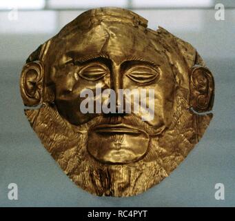 Mask of Agamemnon, gold funerary mask. Mycenaean funerary mask of an unknown Myceanean ruler, 16th century BC (ca.1550 BC), found in Tomb V, Grave Circle A at Mycenae. National Archaeological Museum. Athens, Greece. Stock Photo