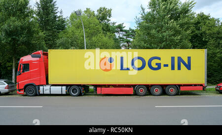 The words 'Log-In' on a truck parked in Berlin, Germany. Stock Photo