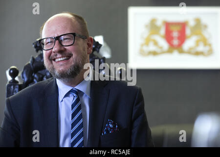 (Editors Note: File Photo) Mayor of Gdansk Pavel Adamovich in his office during an interview in May 2018. A man carrying a knife rushed to a charity event in Gdansk where the mayor was attending and wounded him on 13 January 2019. Stock Photo