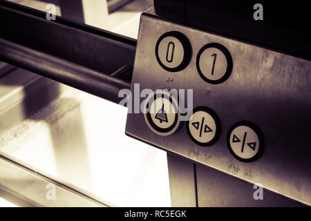 Buttons in a lift Stock Photo