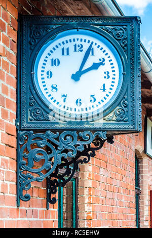 Old clock on the station Stock Photo