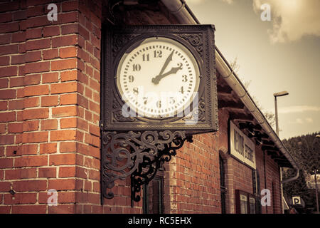 Old clock on the station Stock Photo