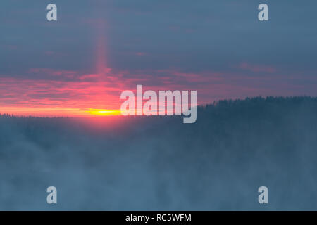 the valley of the river Gauja in winter in the rays of the sunset, landscape Stock Photo