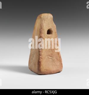 Terracotta loom weight. Culture: Lydian. Dimensions: Length: 2 in. (5 cm). Date: 6th century B.C. or later.  Loom weight with hole. Museum: Metropolitan Museum of Art, New York, USA. Stock Photo