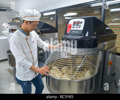 https://l450v.alamy.com/450v/rc5yk5/saigon-vietnam-jan-9-2019-bread-process-by-using-flour-mixing-machine-at-factory-in-saigon-vietnam-rc5yk5.jpg