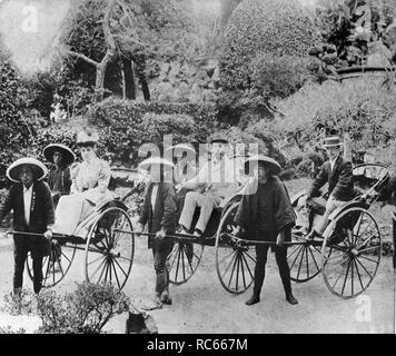 Winston Churchill's father, Lord Randolph Churchill and his mother, Lady Churchill, travelling in rickshaws in Japan. Stock Photo