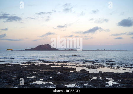 Lobos island, evening view seen from Corralejo Beach on Fuerteventura, Canary Islands, Spain Stock Photo