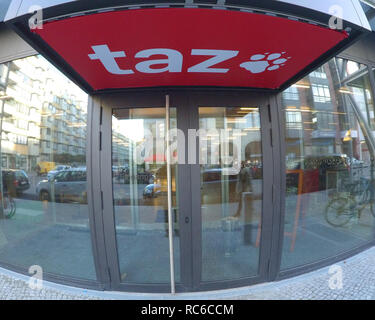 Berlin, Germany. 14th Jan, 2019. 'taz' stands above the entrance of the editorial office building of 'taz' on Friedrichstraße. In the morning several people had penetrated the area, attacking one of the employees and putting up posters. The police ended the short-term occupation. The 'taz' published a message about the incident on the homepage. After that, the intruders were activists of the right-wing 'identity movement'. Credit: Paul Zinken/dpa/Alamy Live News Stock Photo